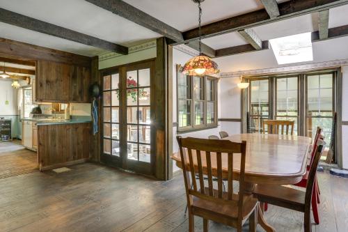 a kitchen and dining room with a table and chairs at Sparrow Bush Retreat with Pool and Screened Porch in Sparrow Bush