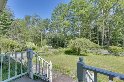 a stairway leading to a yard with trees at Sparrow Bush Retreat with Pool and Screened Porch in Sparrow Bush