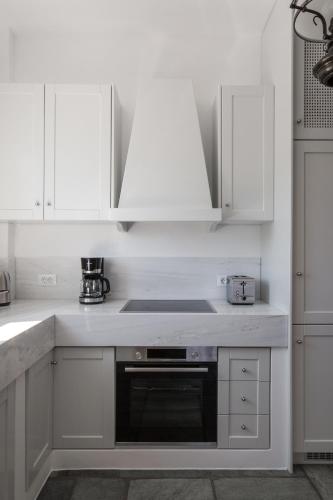 Una cocina o cocineta en Fos Suites
