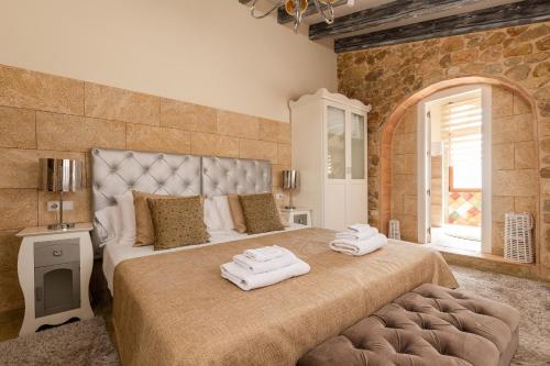 Ένα ή περισσότερα κρεβάτια σε δωμάτιο στο Casa Mistela