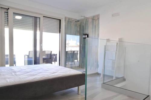 Ένα ή περισσότερα κρεβάτια σε δωμάτιο στο Maison Donnarumma