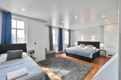 A bed or beds in a room at LUXURY CENTRAL DUPLEX WITH TERRACE