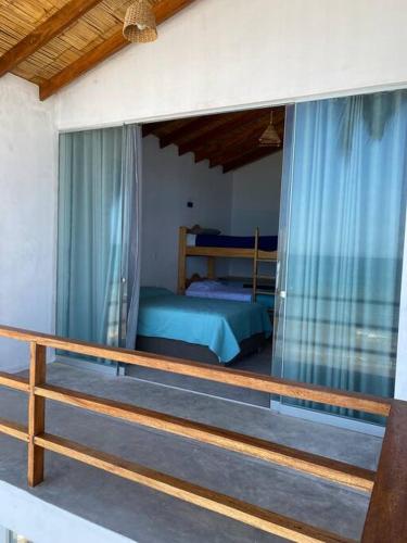 Postel nebo postele na pokoji v ubytování MIAZ Casa de Playa en Canoas de Punta Sal