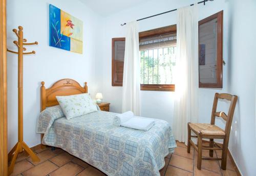 Tempat tidur dalam kamar di Casa Pura by Vintage Travel