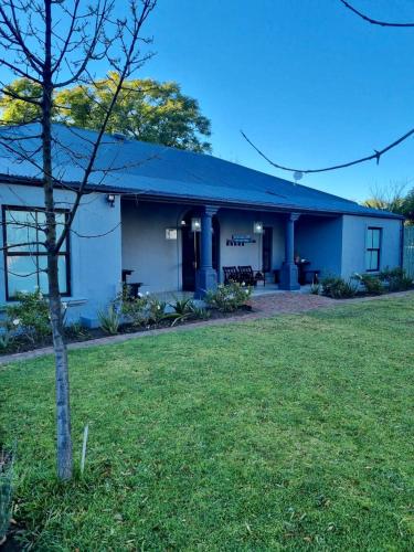 Κήπος έξω από το The Merino Guest House