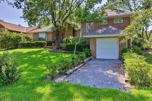 a brick house with a garage in a yard at 16th and Golden in Diamondhead in Diamondhead