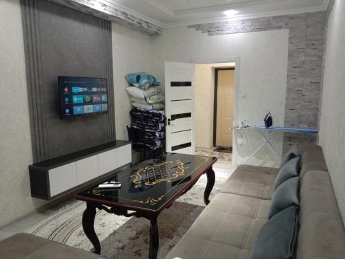 Een TV en/of entertainmentcenter bij GREEN HAUS FOR YOU
