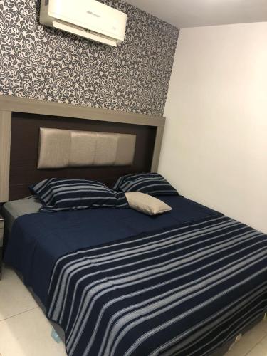 Кровать или кровати в номере La casa azul