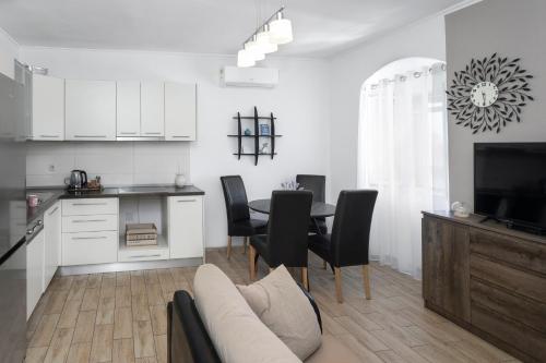 Η κουζίνα ή μικρή κουζίνα στο Apartment Feratjer