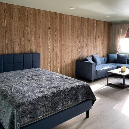 Кровать или кровати в номере ParkWay Yellowstone Guest House #7