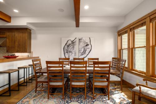 a dining room with a table and chairs at The Porches in Steamboat Springs