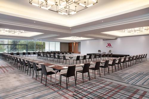 a conference room with long tables and chairs at Budapest Marriott Hotel in Budapest