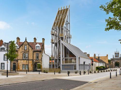 a building with a windmill in the middle of a street at Number Two - Uk44865 in Bishop Auckland