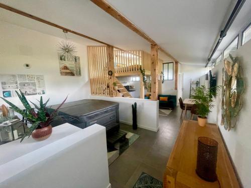 Posezení v ubytování Loft avec jacuzzi et terrasse privés