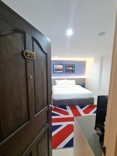 Poonsuk Place Hotelにあるベッド