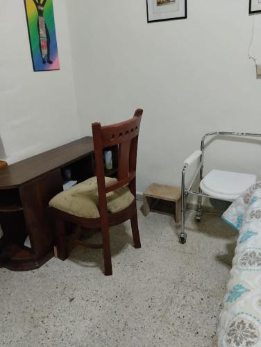 Postel nebo postele na pokoji v ubytování Casa Mamá Chelita