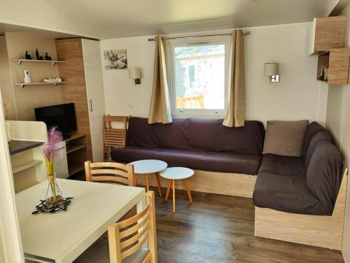 Afbeelding uit fotogalerij van Mobil-home VI 58 à Vias - La Carabasse - Camping Siblu avec piscine payante in Vias