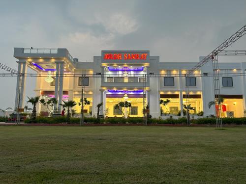 a large building with a sign that reads arena santa ana at Awadh Samrat Resort in Ayodhya