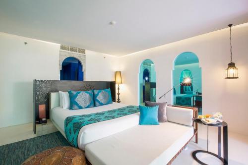 Postel nebo postele na pokoji v ubytování Marrakesh Hua Hin Resort & Spa