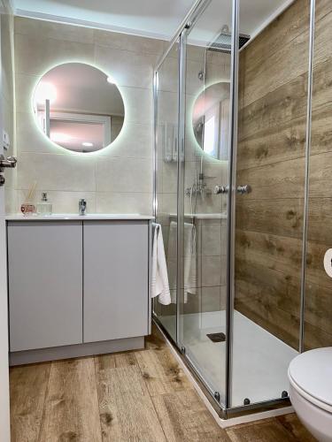 a bathroom with a shower and a toilet at N&E - Home Celanova Rúa Manuel Lezón in Celanova