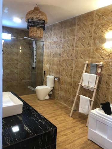 Vannituba majutusasutuses Villa Bari Loft