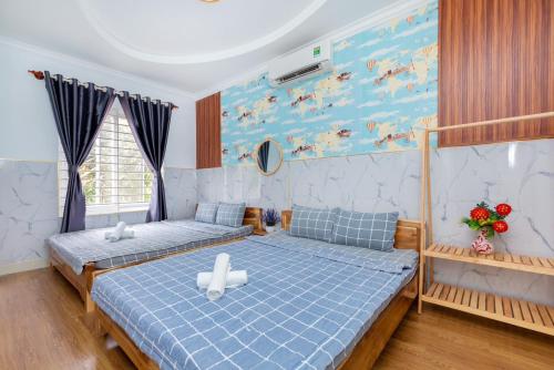 Giường trong phòng chung tại Villa Hồ Bơi BLUE DAY TÔ NGỌC VÂN