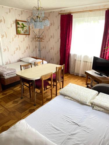 Een bed of bedden in een kamer bij Pas Ireną Šventojoje