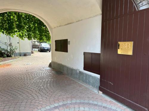 an entrance to a building with a sign on it at B&B Caselle in Caselle Torinese