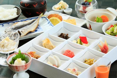 a tray of different types of food on a table at Tensui Saryo in Hakone