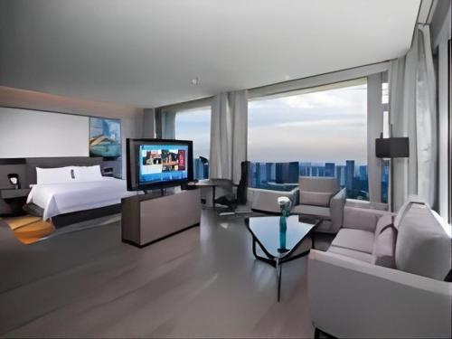 Hampton By Hilton Hangzhou Future Sign Technology Cityにあるテレビまたはエンターテインメントセンター