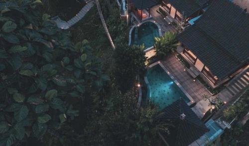 Bazén v ubytování Portobello Villa Ubud nebo v jeho okolí
