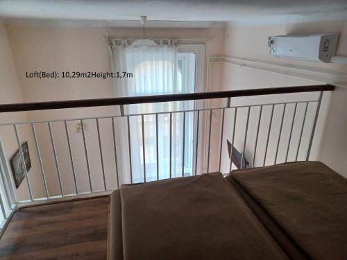 Loft House Budapestにあるベッド
