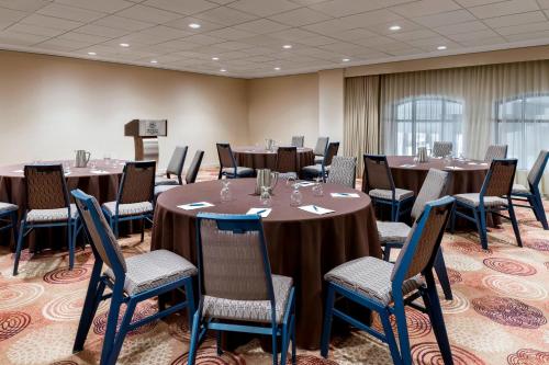 a conference room with long tables and chairs at Sheraton Centre Toronto Hotel in Toronto