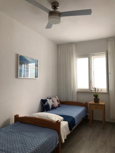 Postel nebo postele na pokoji v ubytování More Mare