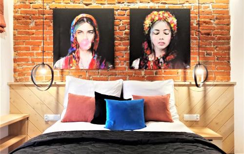 Cama o camas de una habitación en VIP APARTAMENTY Chałubińskiego APART