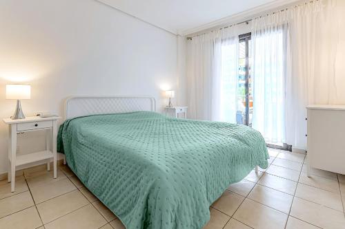 A bed or beds in a room at Cozy Holiday Home 1 Bed 2 Bath Balcon Los Gigantes