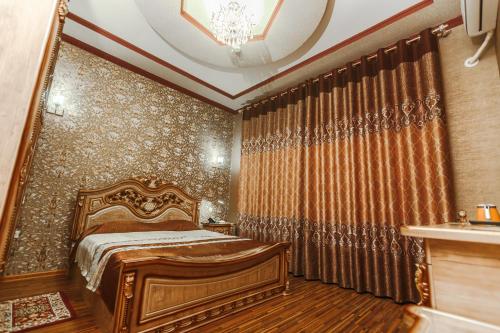 Кровать или кровати в номере Khiva Silk Road
