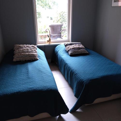 Postel nebo postele na pokoji v ubytování Bed & Breakfast Appartement 't Haventje
