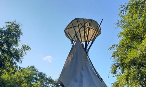 a basketball hoop in front of some trees at Guest House Sněžník in Sněžnik