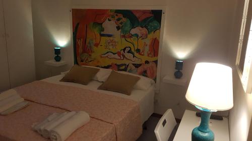 Postel nebo postele na pokoji v ubytování B & B Villa Matisse