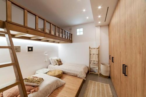 Ένα ή περισσότερα κρεβάτια σε δωμάτιο στο Salt Life Villa