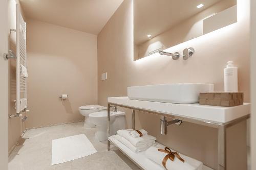 Kúpeľňa v ubytovaní Dei Priori Boutique Hotel
