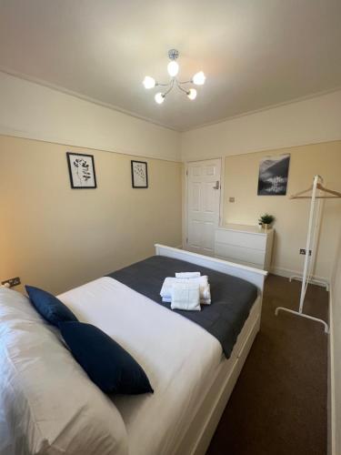 Ένα ή περισσότερα κρεβάτια σε δωμάτιο στο Stunning Wembley Stadium Flat
