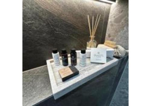 a table with some products on top of it at On The Sea Suite&Spa in Methana