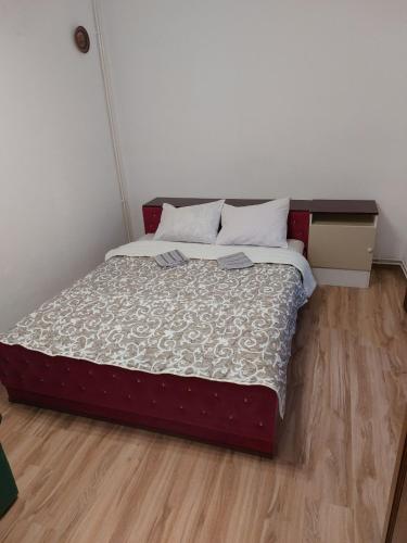Cama o camas de una habitación en Royal Rose smeštaj