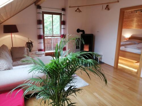 A bed or beds in a room at Appartement Moni / Golf & Ski - TOP 9