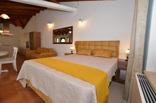 Ένα ή περισσότερα κρεβάτια σε δωμάτιο στο Casa degli Artisti