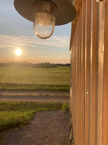 a view of a sunset from the side of a building at Brygghuset in Linköping