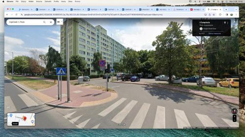 an image of a street with a cross walk at Mieszkanie w centrum z oddzielną sypialnią in Płock