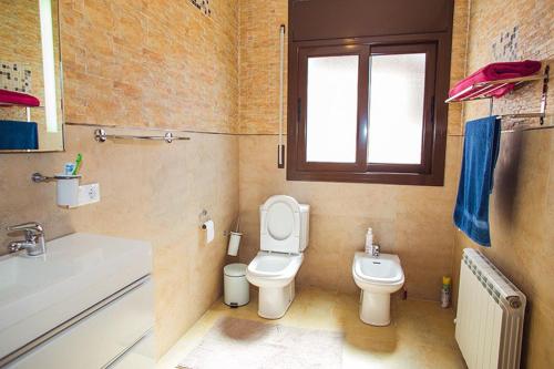 Ванная комната в Villa Rossinyols